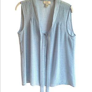 Loft sleeveless blouse sheer and light weight.